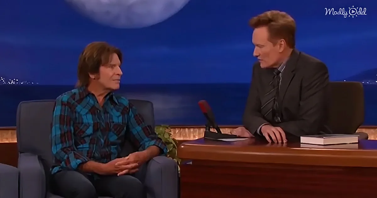 John Fogerty singing "Have You Ever Seen the Rain”