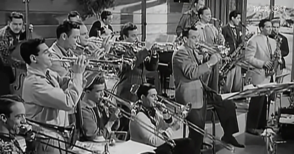 A jazz band with trumpets, trombones, and saxophones playing in a lively performance.