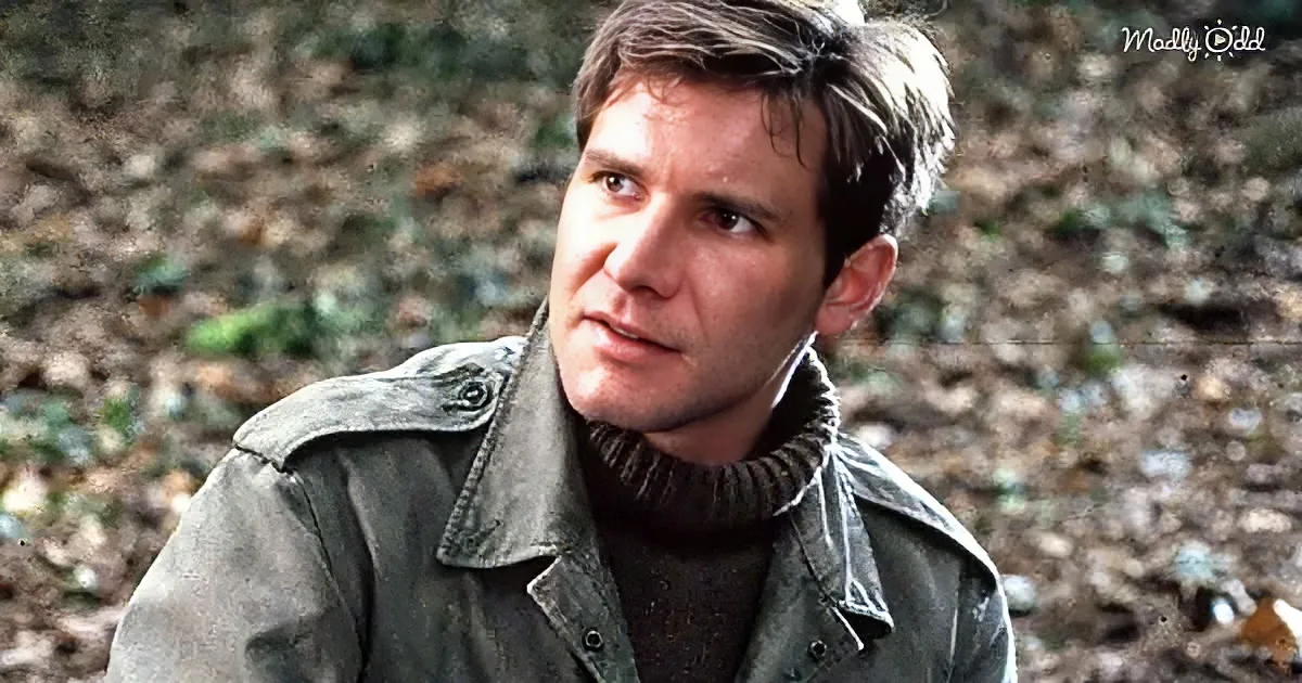 Harrison Ford, rugged, in a green jacket, looks off to the side, amidst a forest backdrop.