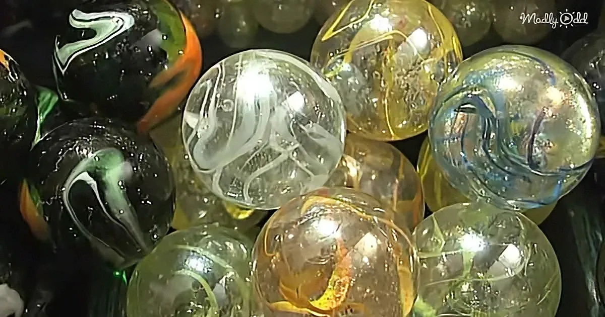 Colorful marbles with swirls and reflections, glossy and shiny, in a pile.
