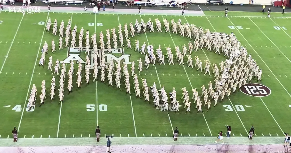 A marching band forms a large "A&M" on a football field.