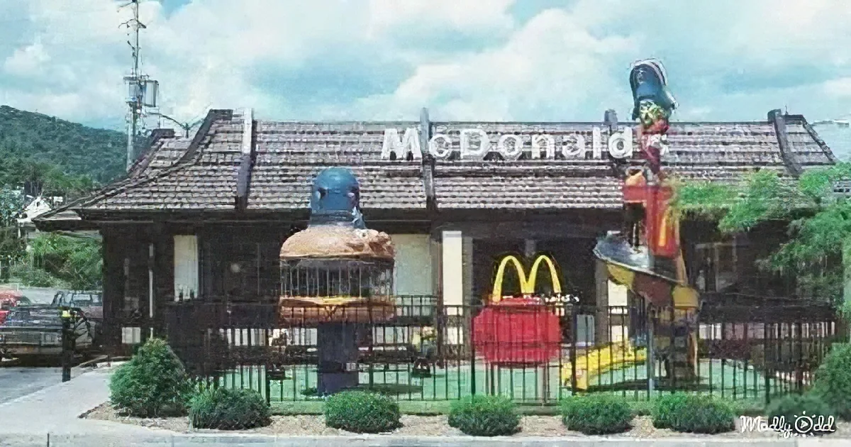A McDonald's restaurant with a unique, cartoonish design featuring large, colorful sculptures of food items.
