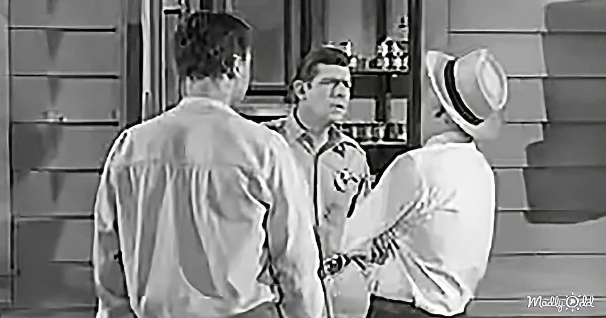 Sheriff Andy listening to Mr. Carter's accusations
