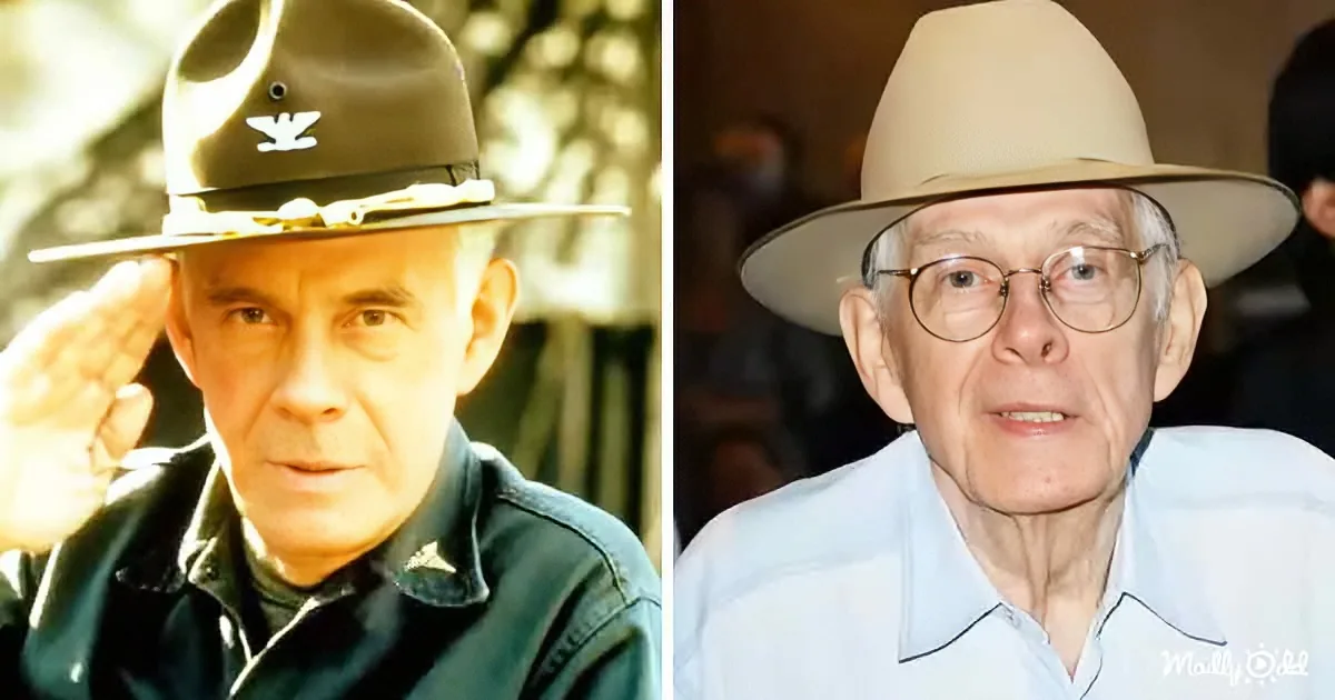 A man in a military uniform saluting and another older man in a hat and glasses.
