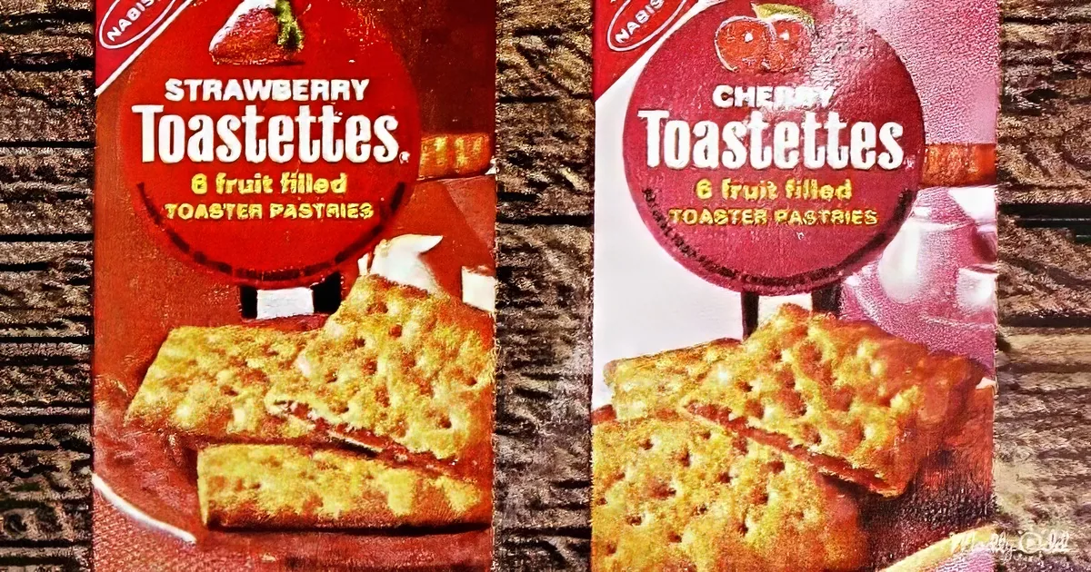 Two vintage Nabisco Toastettes boxes, one strawberry, one cherry, showcasing fruit-filled toaster pastries.