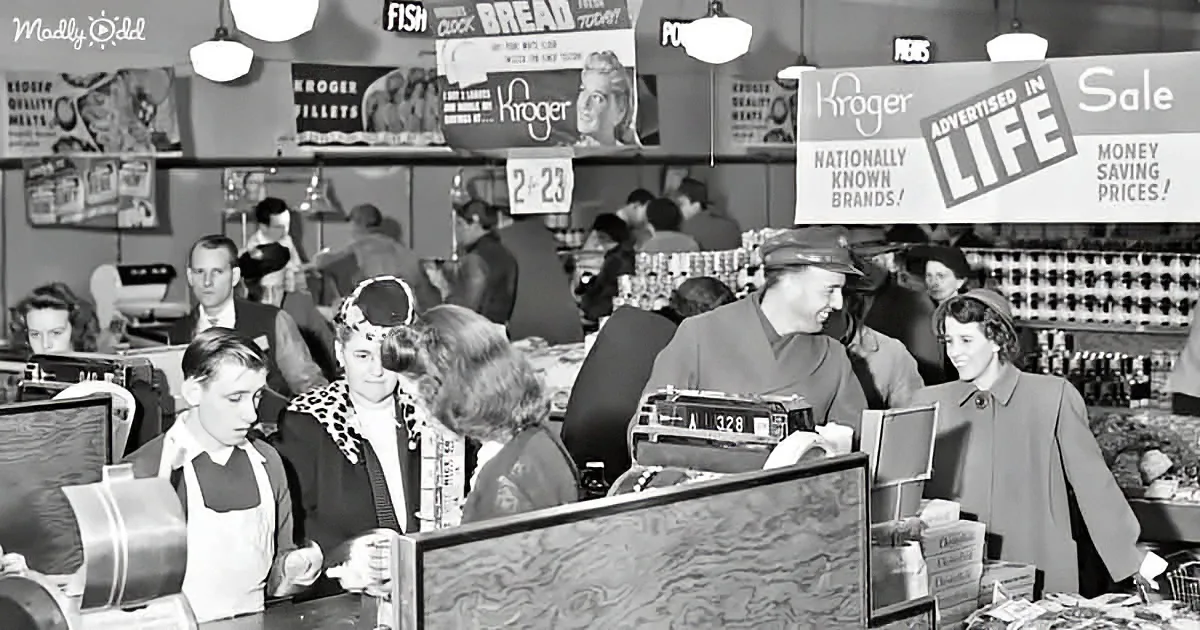 Cashier at Kroger supermarket assists customers, vintage signage and advertisements visible.