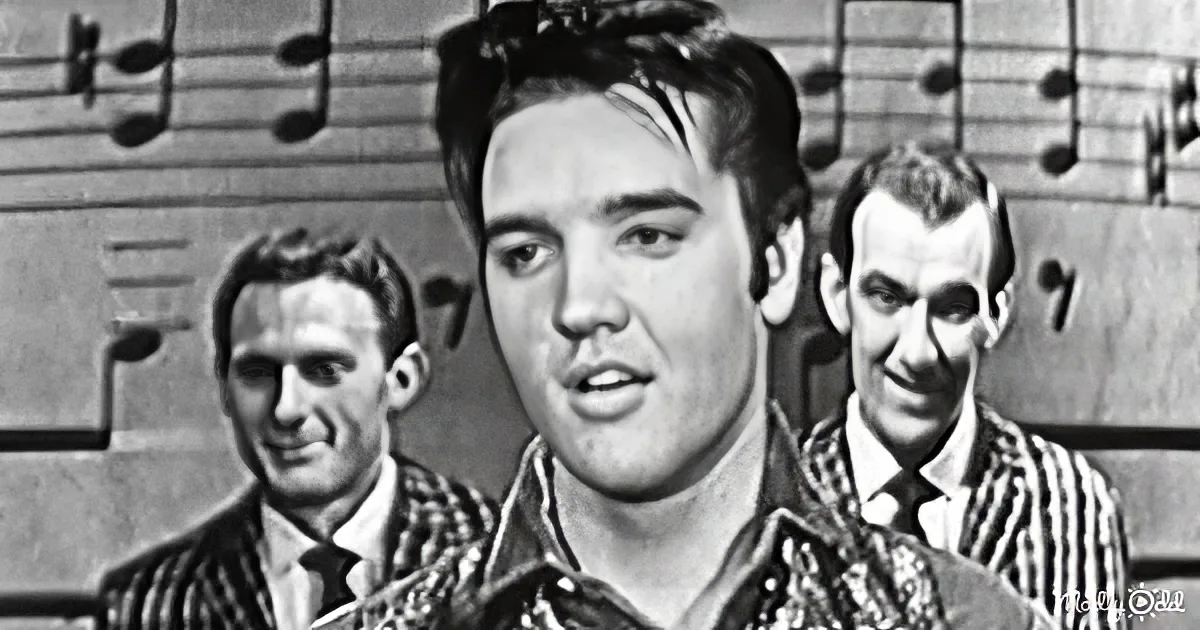 Elvis Presley sings passionately, flanked by two men in plaid shirts, with musical notes in the background.
