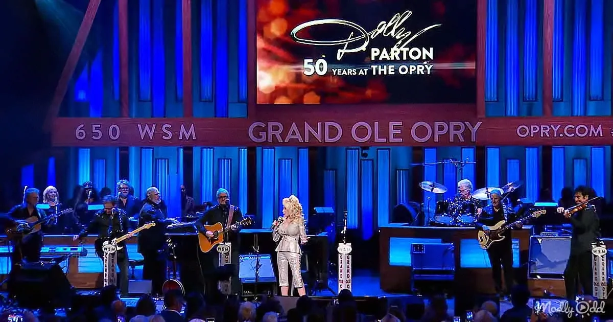 Dolly Parton performs on stage at the Grand Ole Opry, celebrating 50 years.