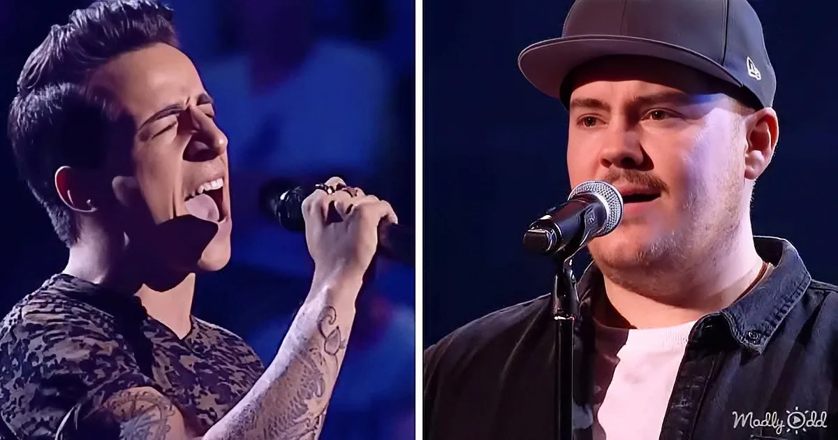 A man with tattoos sings passionately, while another man in a cap and jacket sings into a microphone.