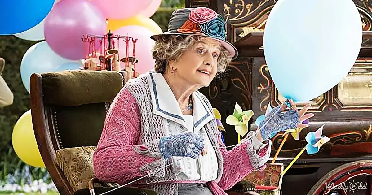 An elderly woman in a colorful hat and gloves is knitting, surrounded by balloons and a vintage setting.