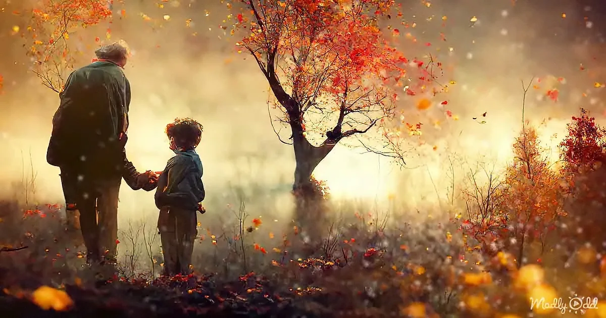 An elderly man and a child stand together in a misty, autumnal field, surrounded by falling leaves and a tree with...