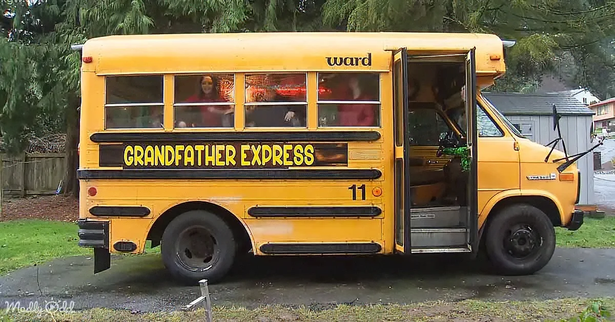 A yellow school bus labeled "Grandfather Express" with the number 11 is parked, doors open, and people inside.