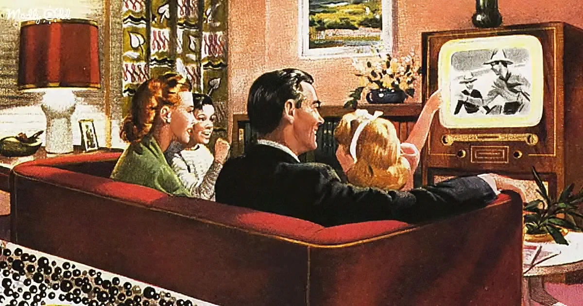A family sits on a red couch watching an old-fashioned TV, enjoying a scene with a man and woman.