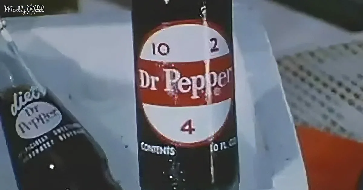 A Dr Pepper bottle with a red and white label is prominently displayed in a close-up shot.