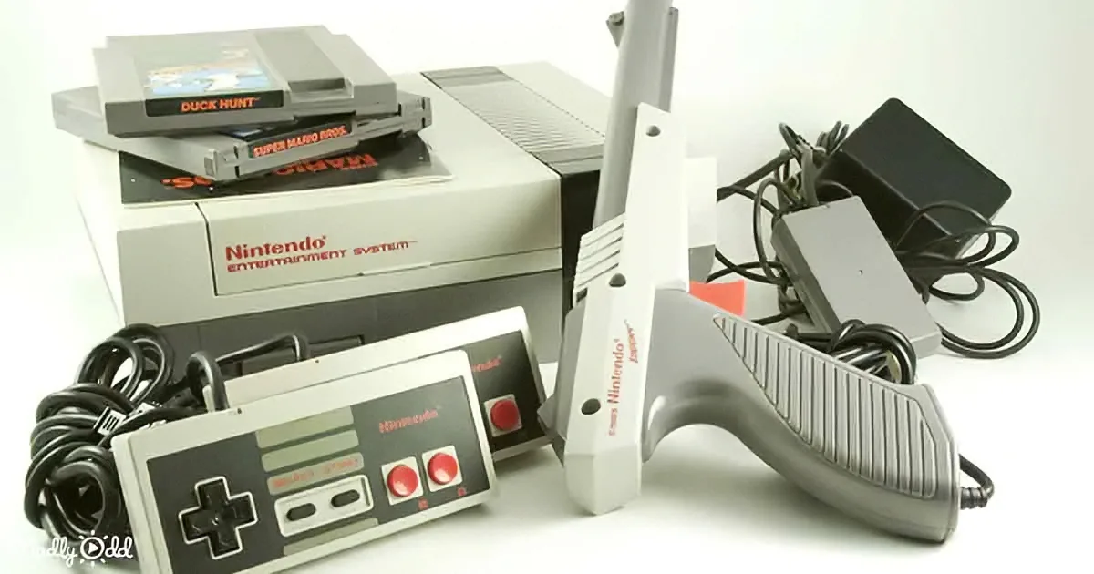 A Nintendo Entertainment System with a Zapper accessory, controller, and games like Duck Hunt and Super Mario Bros.