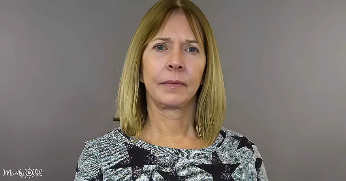 A woman with shoulder-length blonde hair and a star-patterned top stands against a plain background.