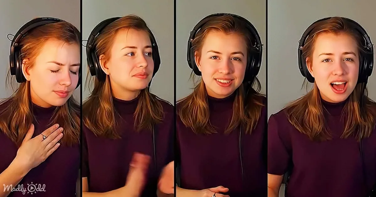 A person wearing headphones and a maroon turtleneck, showing various expressions and gestures.
