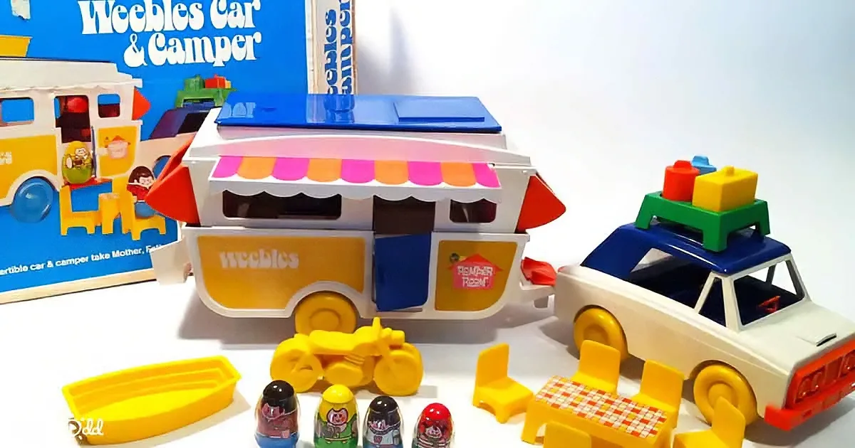 A colorful Weebles Car & Camper toy set with accessories like a car, boat, and figures.