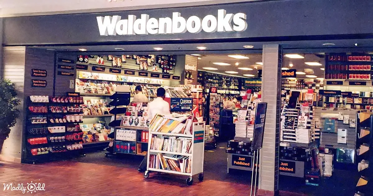 Waldenbooks store interior with shelves, books, and people browsing.