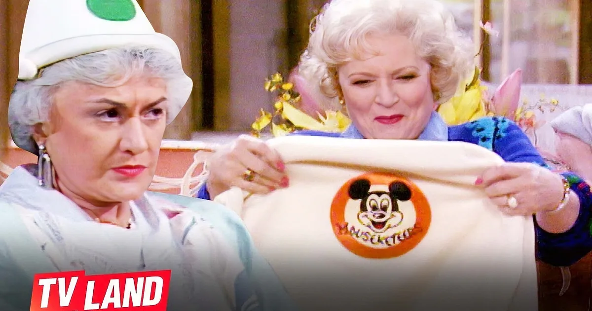 Betty White holds a Mickey Mouse shirt, smiling, with text about 'The Golden Girls' birthday moments.