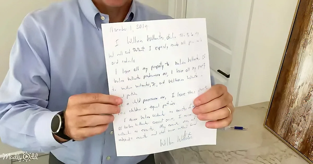 A man holds a handwritten document dated November 1, 2019, discussing property and testamentary matters.
