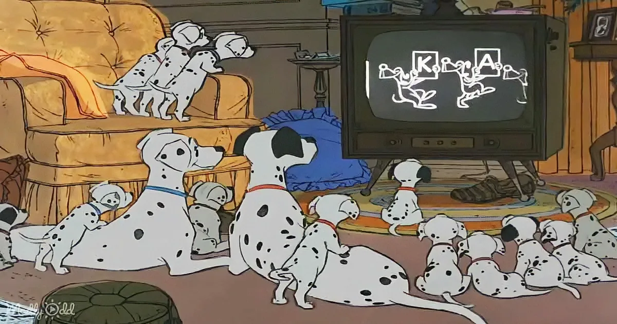 Dalmatian puppies gather around a TV, watching a cartoon.