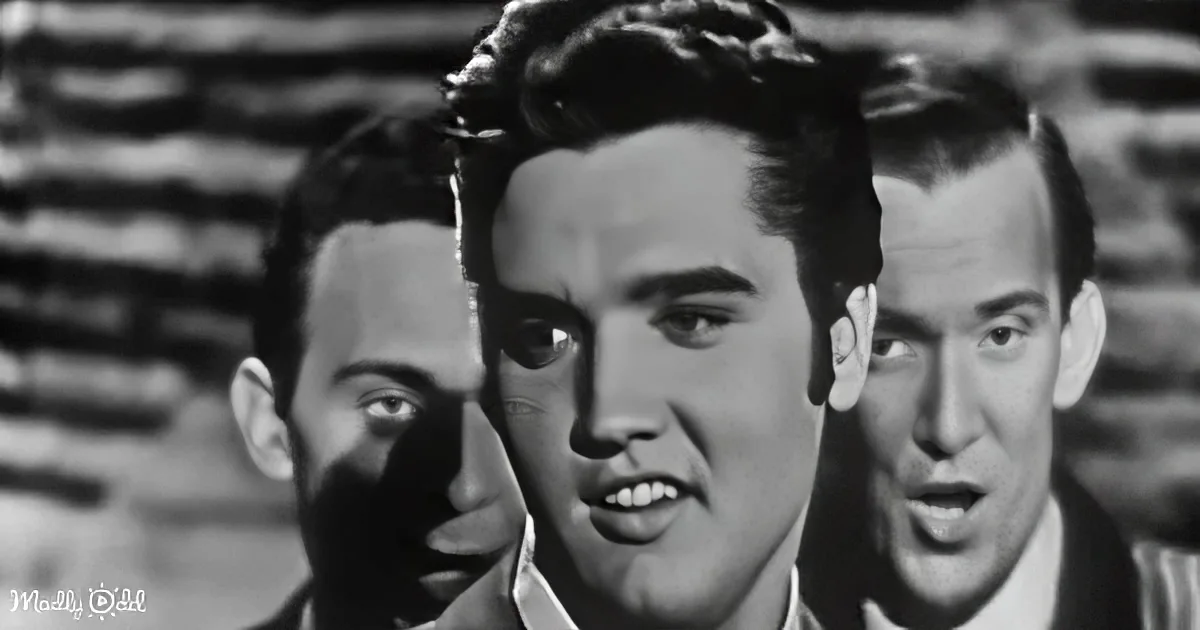 Elvis Presley, center, with two men behind him, all in suits, in a black-and-white scene.