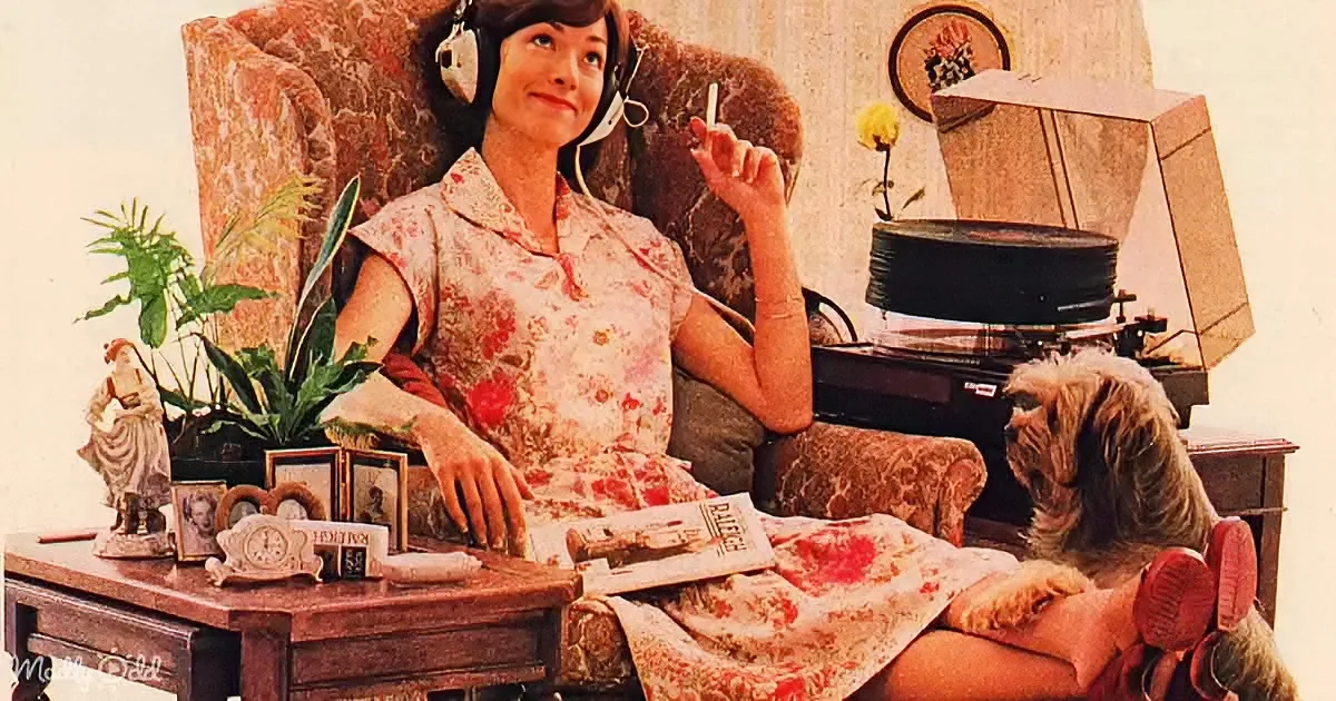 A woman in floral dress sits in a patterned armchair, smoking, with a dog beside her, surrounded by vintage decor.