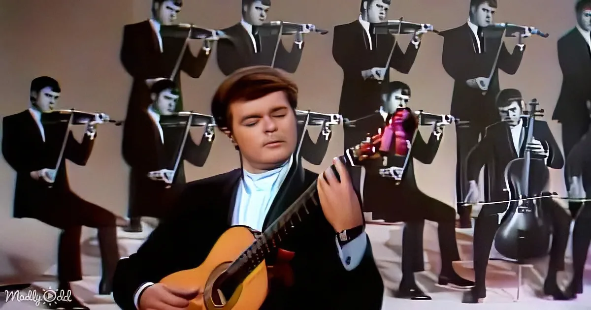 A man in a suit plays a guitar with a surreal background of identical musicians.