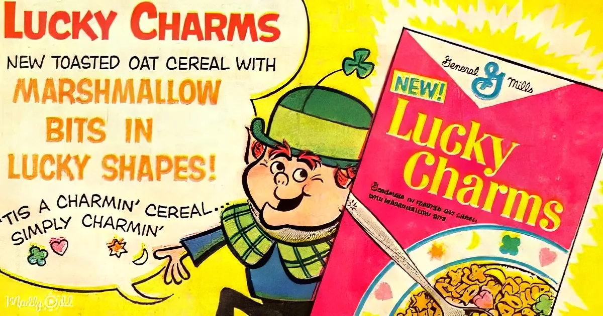 A vintage Lucky Charms cereal advertisement featuring a smiling leprechaun holding a box.