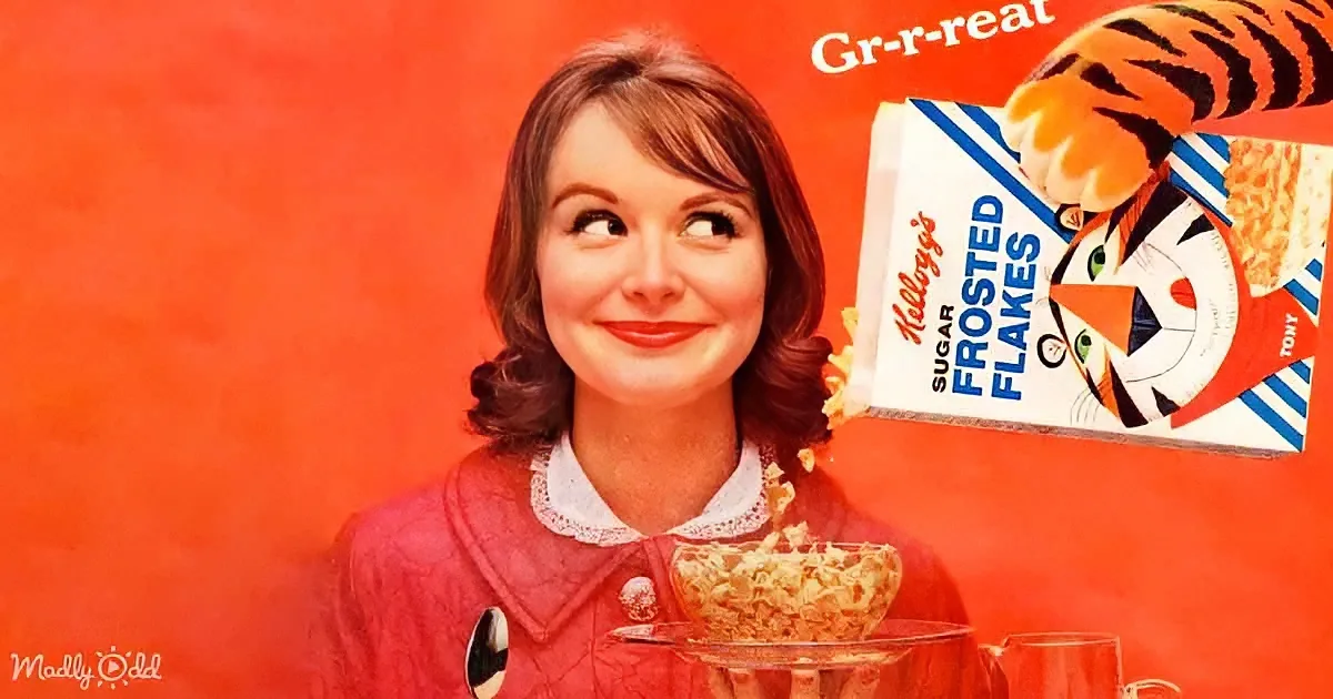 Woman in red holding bowl of cereal, smiling, with Kellogg's Sugar Frosted Flakes box and tiger mascot.