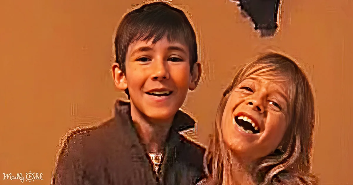 Two children, one smiling and one laughing, appear in a sepia-toned, textured image with a torn-paper effect.