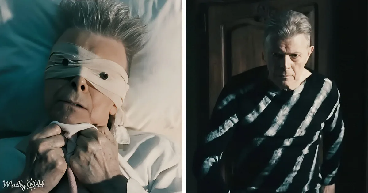 A blindfolded man lies in bed, while another man in a striped shirt stands in a dimly lit room.