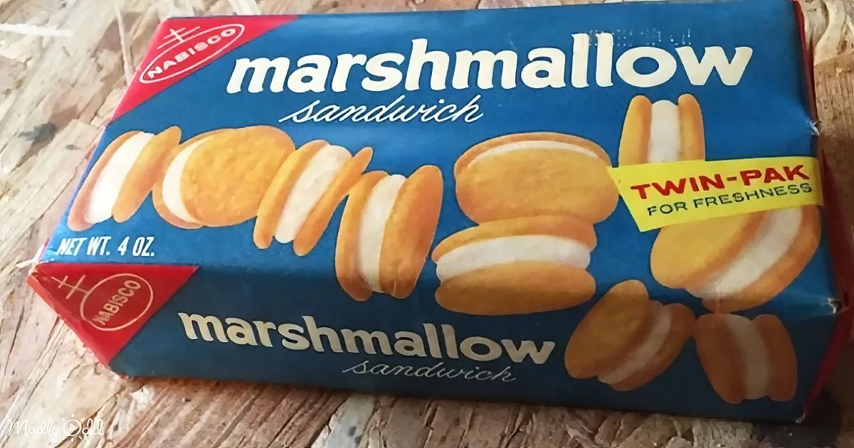 A Nabisco Marshmallow Sandwich cookies twin-pack box is displayed on a wooden surface.