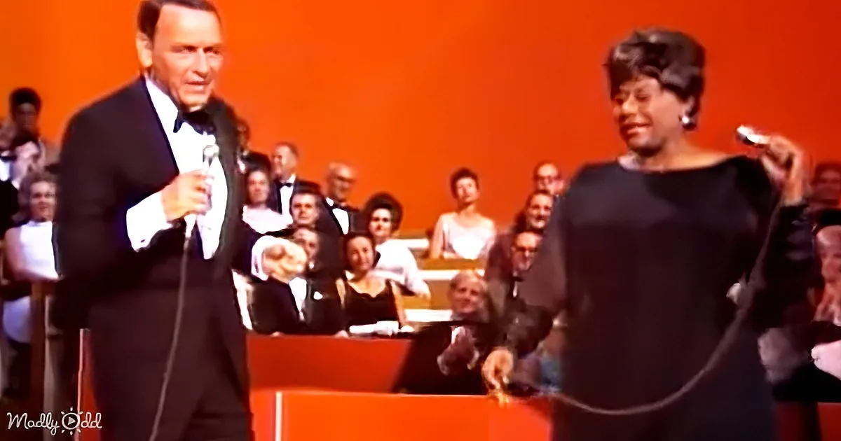 Frank Sinatra and Aretha Franklin perform on stage in front of an audience.