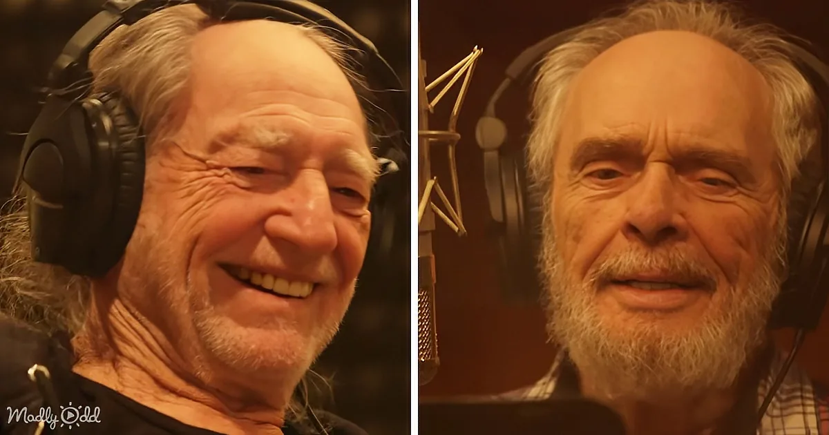 Two older men with headphones, smiling, in what appears to be a recording studio setting.