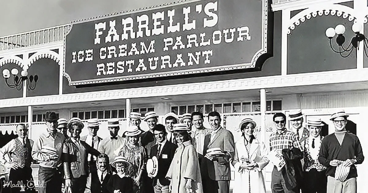 People gather in front of Farrell's Ice Cream Parlour and Restaurant, wearing hats and suits, under a large sign.
