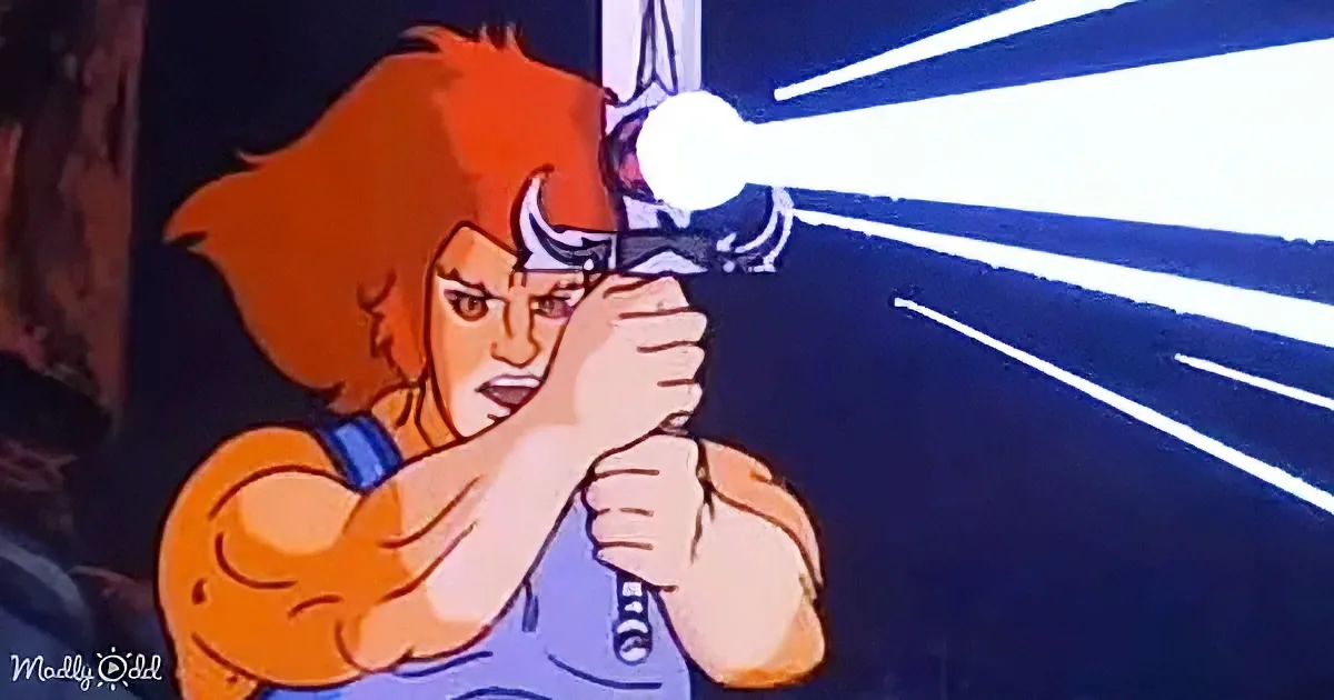 A muscular animated character with red hair and a horned helmet is holding a glowing object, surrounded by blue light...