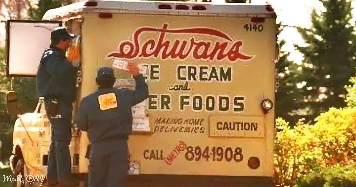 A vintage Schwans delivery truck with workers loading ice cream and other foods.