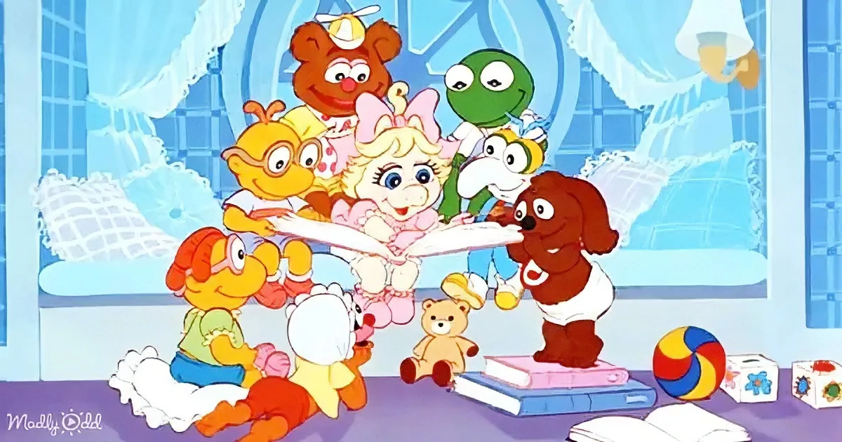 Baby Kermit leads a group of baby Muppets in a playful dance.