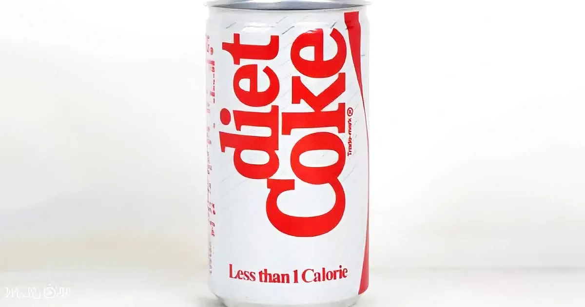 A Diet Coke can with red lettering on a white background is shown.