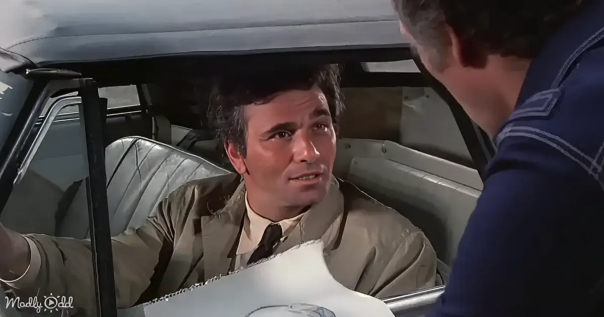A man in a car holds a drawing, looking at another person outside the vehicle.