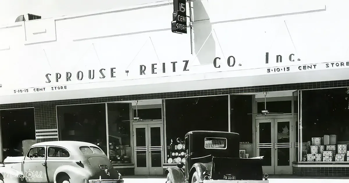 Vintage storefronts: Kress, Ben Franklin, and Murphy's, with classic cars and people in front.