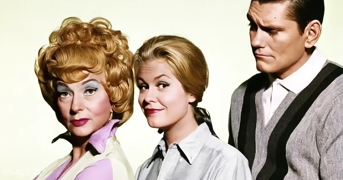 Three individuals in vintage attire pose together, with one woman in a light green jacket and another in a gray shirt.