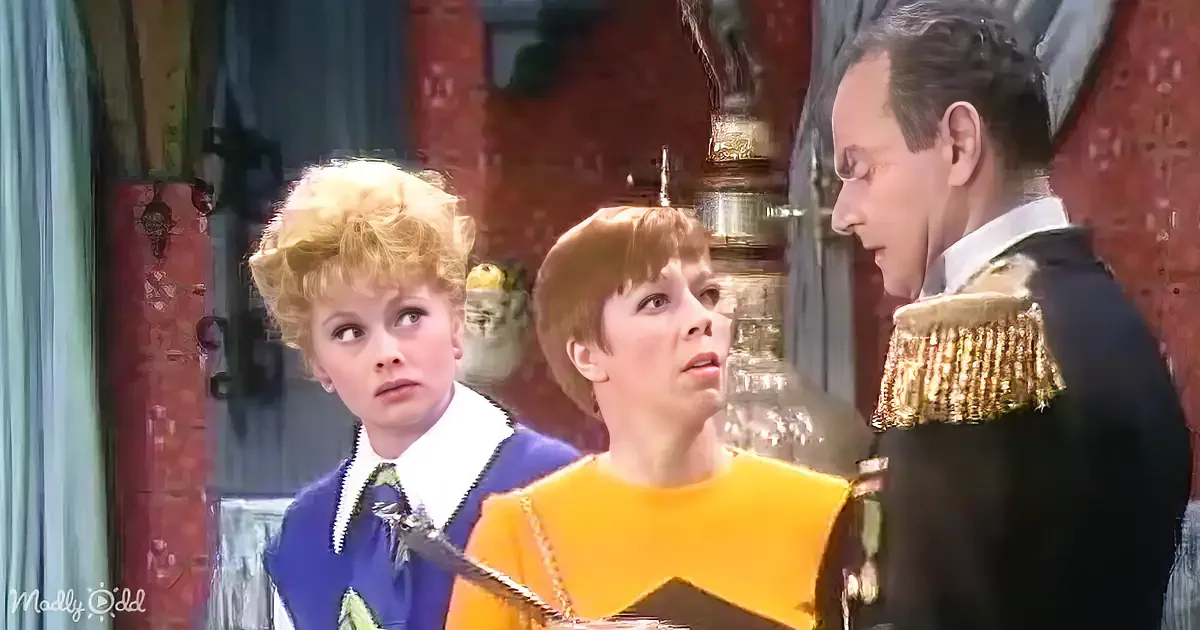 A woman in a blue dress and a man in a military uniform are engaged in conversation with another woman in a yellow dress.
