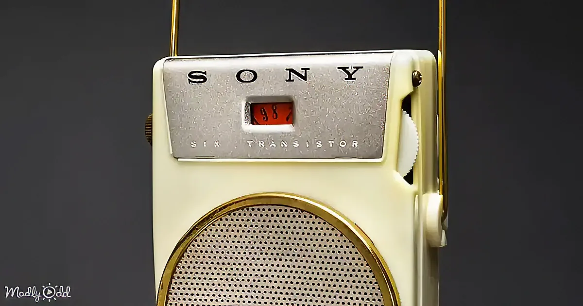 A vintage Sony Six Transistor radio with a cream body and a red digital display.