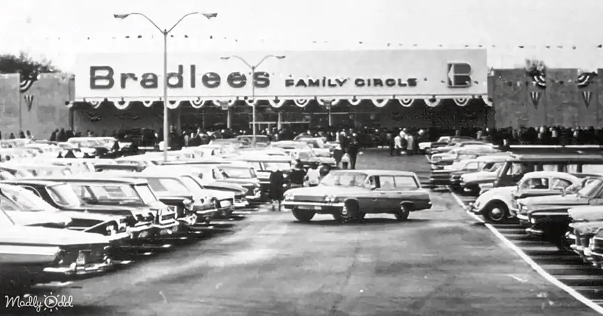 Bradlees Family Circle store with crowded parking lot and vintage cars.