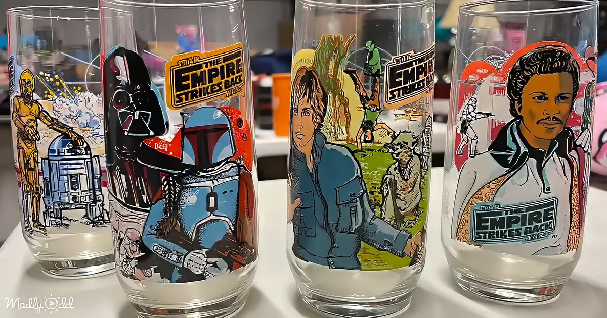 Four Star Wars Empire Strikes Back-themed glasses featuring characters and scenes from the movie.