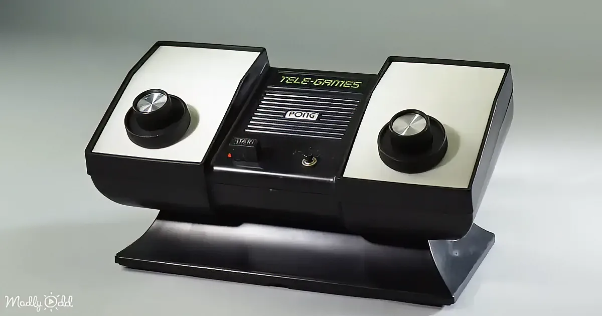 A vintage Atari Pong console with two paddles and a central start button is displayed.