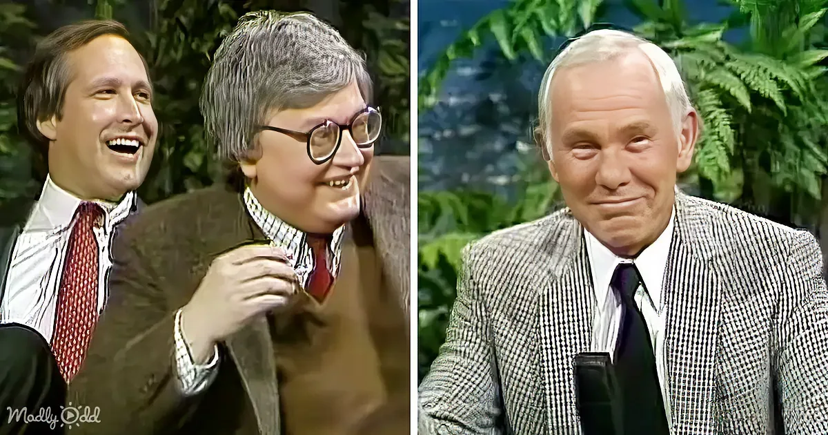 Two men in suits, one laughing, one serious, against a green backdrop.